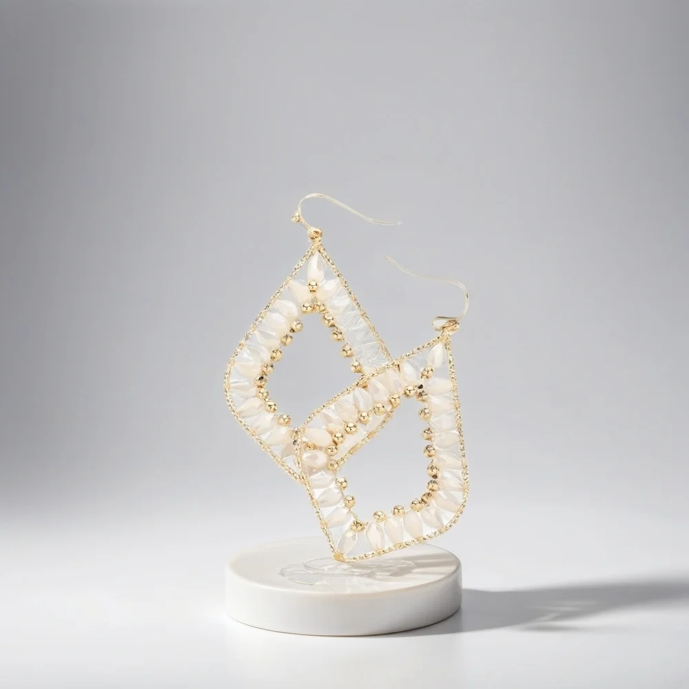 Creme Petal Paradise: Bead-Embellished Dangle Earrings - Picture 3 of 3